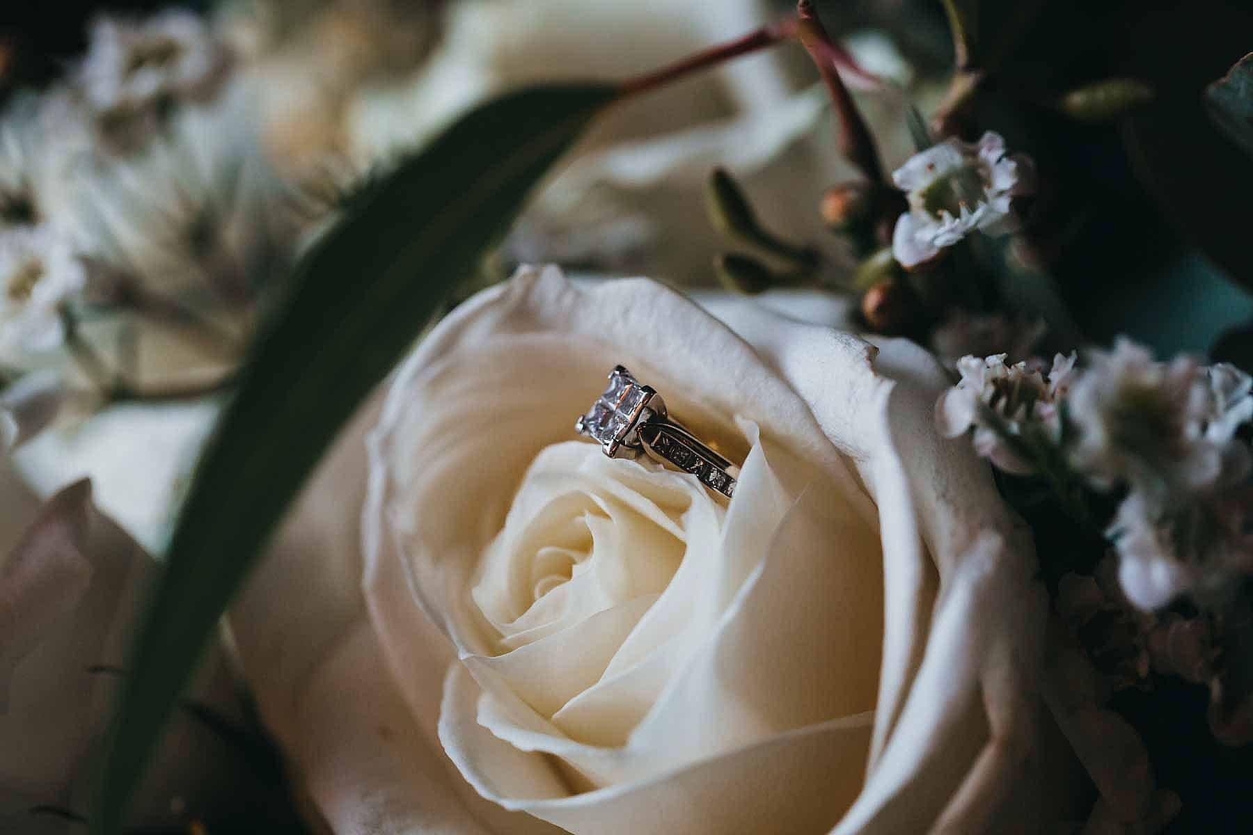 Elysium-Photography-Camden-Wedding-Photographer-2 Detail photograph of a brides wedding ring sitting in her wedding bouquet