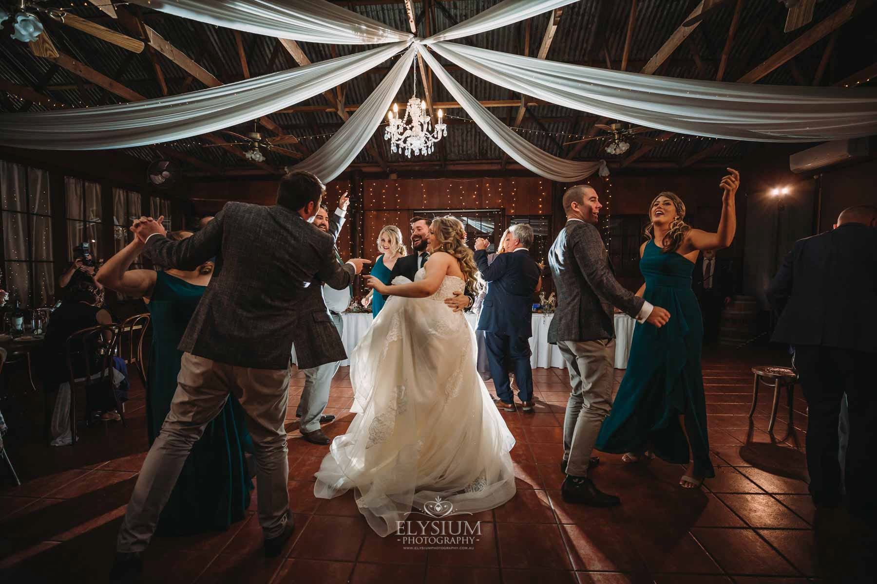 Gledswood Wedding Photo - the newlyweds dance during the reception