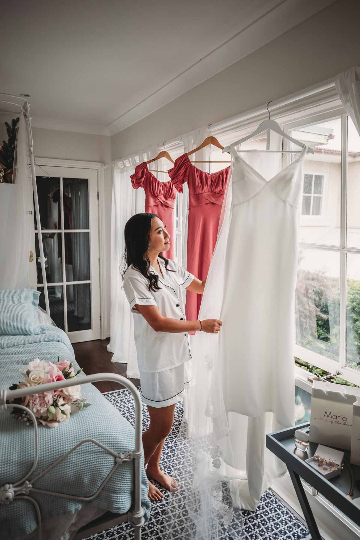 Elysium-Photography-Sydney-Wedding-Photographer-J&T-124 A bride preparing her wedding dress before the ceremony