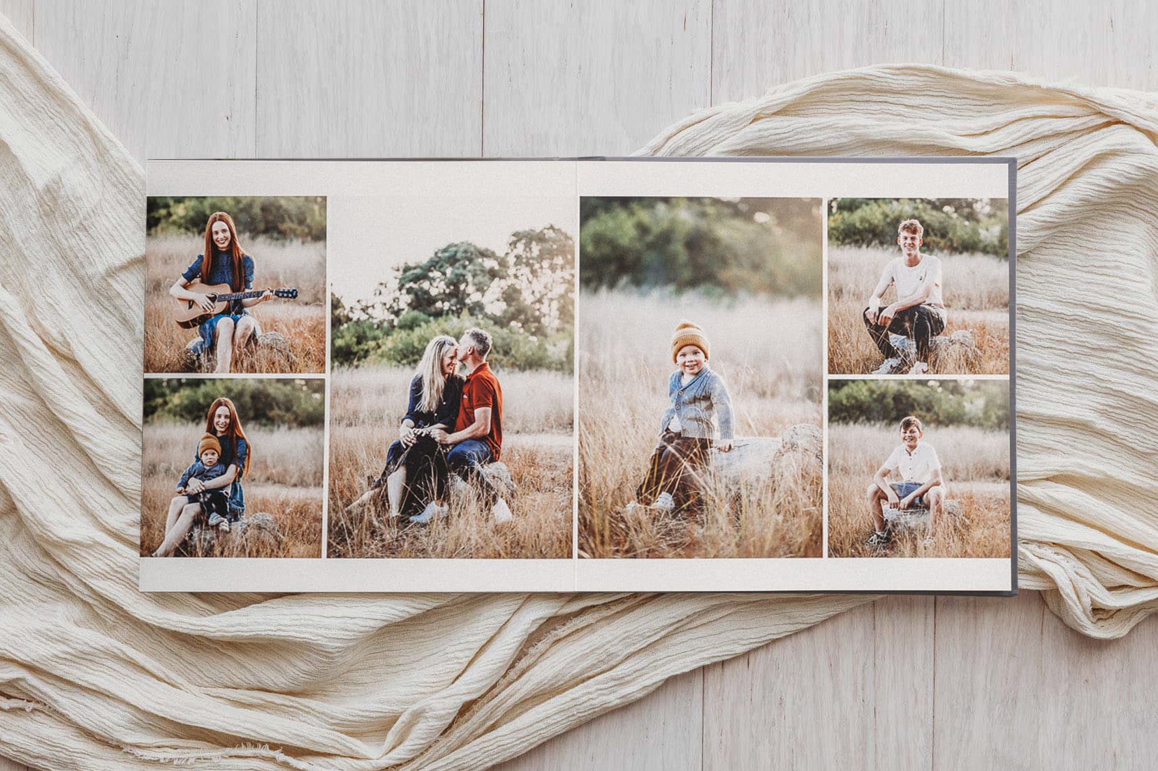 A family photo album showing a layout with images of parents and kids on a white floor