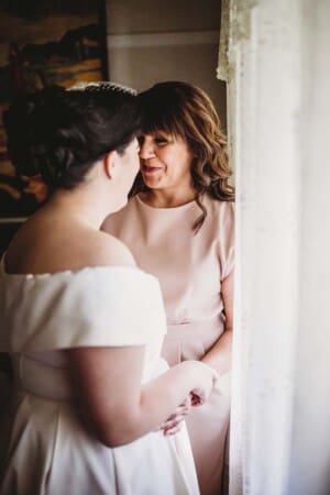Sydney Wedding Photographer - bride holding hands with her mother
