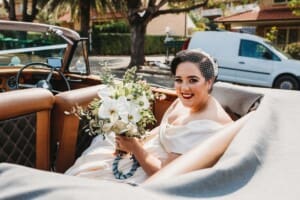 Sydney Wedding Photographer - bride sitting in the wedding car