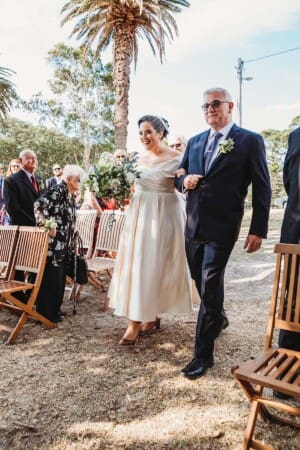 Sydney Wedding Photographer - bride walks down the aisle with her father