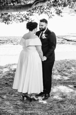 Sydney Wedding Photographer - bride and groom holding hands during the ceremony