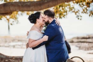 Sydney Wedding Photographer - bride and groom share their first married kiss