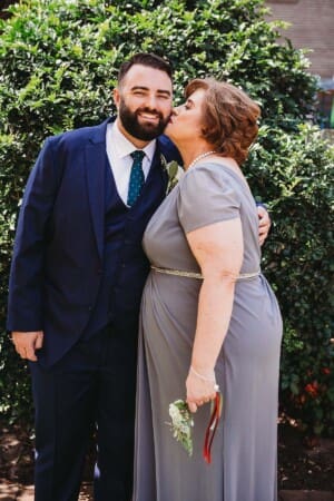 Sydney Wedding Photographer - grooms mother kisses his cheek