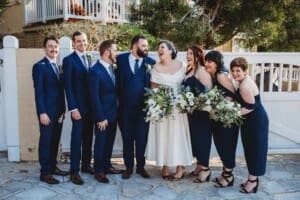 Sydney Wedding Photographer - bridal party share a joke and laugh