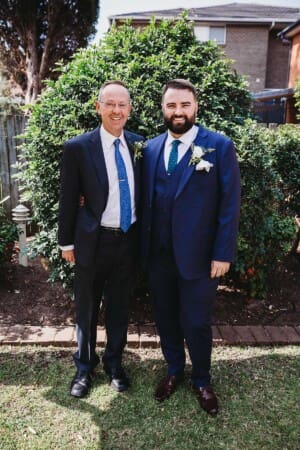 Sydney Wedding Photographer - groom stands with his father