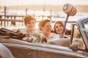 Sydney Wedding Photographer - bridal party sitting in the wedding car