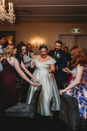 Sydney Wedding Photographer - bride and groom enter the reception venue