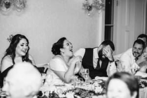 Sydney Wedding Photographer - bride laughs during the speeches at the reception