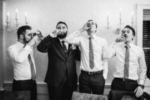 Sydney Wedding Photographer - bridal party do shots at the reception