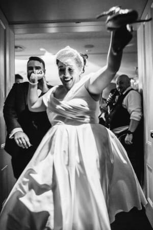 Sydney Wedding Photographer - bride and groom depart the reception venue