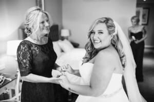Gledswood Wedding - bride smiles with her mum before the ceremony