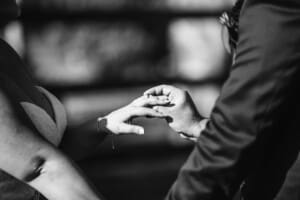 Gledswood Wedding - bride and groom exchange rings during the ceremony