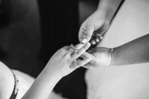 Gledswood Wedding - bride exchanges gifts with her flower girl