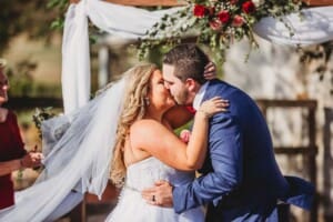 Gledswood Wedding - bride and groom share their first married kiss