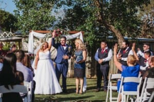Gledswood Wedding - bride and groom fist pump after the ceremony