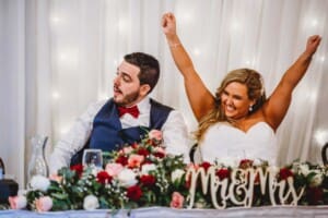 Gledswood Wedding - bride and groom laugh during the speeches