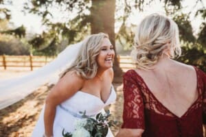 Gledswood Wedding - bride laughs with her mother