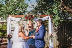 Gledswood Wedding - bride and groom hold hands during the ceremony