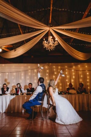 Gledswood Wedding - bride and groom play the shoe game