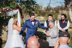 Gledswood Wedding - guest reads a verse during the ceremony