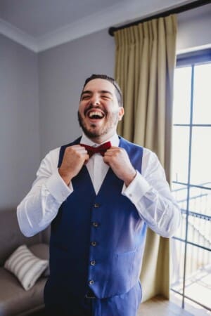 Gledswood Wedding - the groom adjusts his tie
