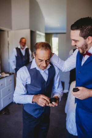 Gledswood Wedding - groom exchanges gifts with his father