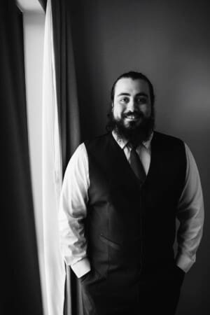 Gledswood Wedding - groomsman portrait in black and white