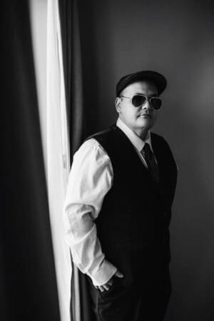 Gledswood Wedding - groomsman portrait in black and white