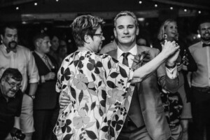 Sydney Wedding Photographer - A groom dances with the brides mother