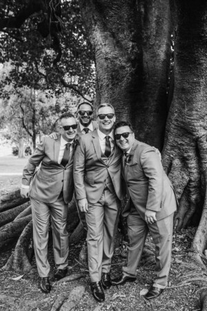 Sydney Wedding Photographer - Groomsmen posed together in matching sunglasses