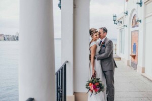 Sydney wedding photographer - A groom whispers into his brides ear