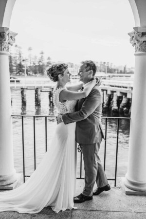 Sydney wedding photographer - Newlyweds embrace on their wedding day