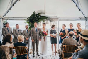 Sydney wedding photographer - Bridal party standing at the ceremony ceremony