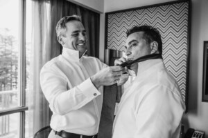 Sydney Wedding - Groom doing up the groomsman's tie before the wedding
