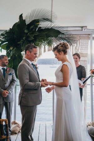Sydney Wedding Photographer - bride and groom exchange wedding rings