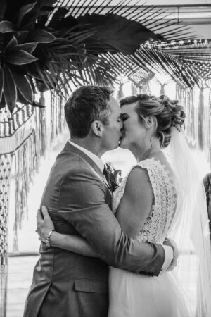 Sydney Wedding Photographer - Bride and groom share their first kiss