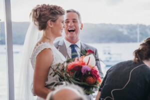 Sydney Wedding Photographer - Bride and groom share a laugh after the wedding