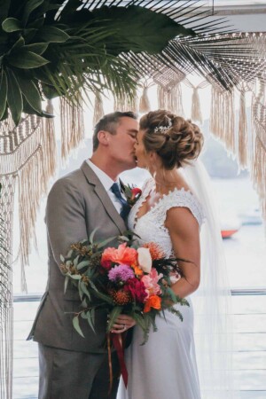 Sydney Wedding Photographer - Bride and groom kiss after getting married