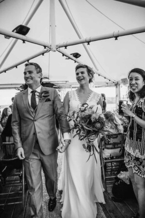 Sydney Wedding Photographer - bride and groom exit their ceremony