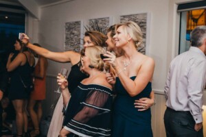 Sydney Wedding Photographer - guests taking photos at the reception