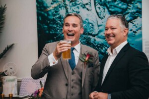 Sydney Wedding Photographer - Groom shares a drink with his mate