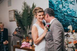 Sydney Wedding Photographer - Bride and groom hug during the reception speech