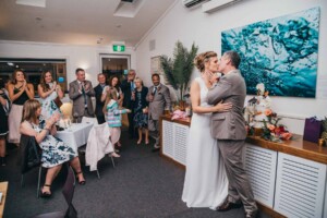 Sydney Wedding Photographer - Bride and groom kiss during the reception speech