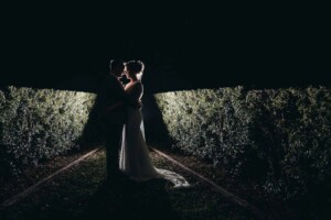 Sydney Wedding - Night photograph of a bride and groom in venue gardens