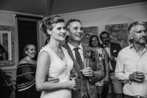 Sydney Wedding Photographer - Bride and groom listening to the wedding speeches