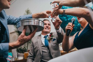 Sydney Wedding Photographer - bridal party do shots during the reception