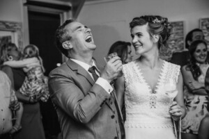Sydney Wedding Photographer - Groom laughing during the speeches